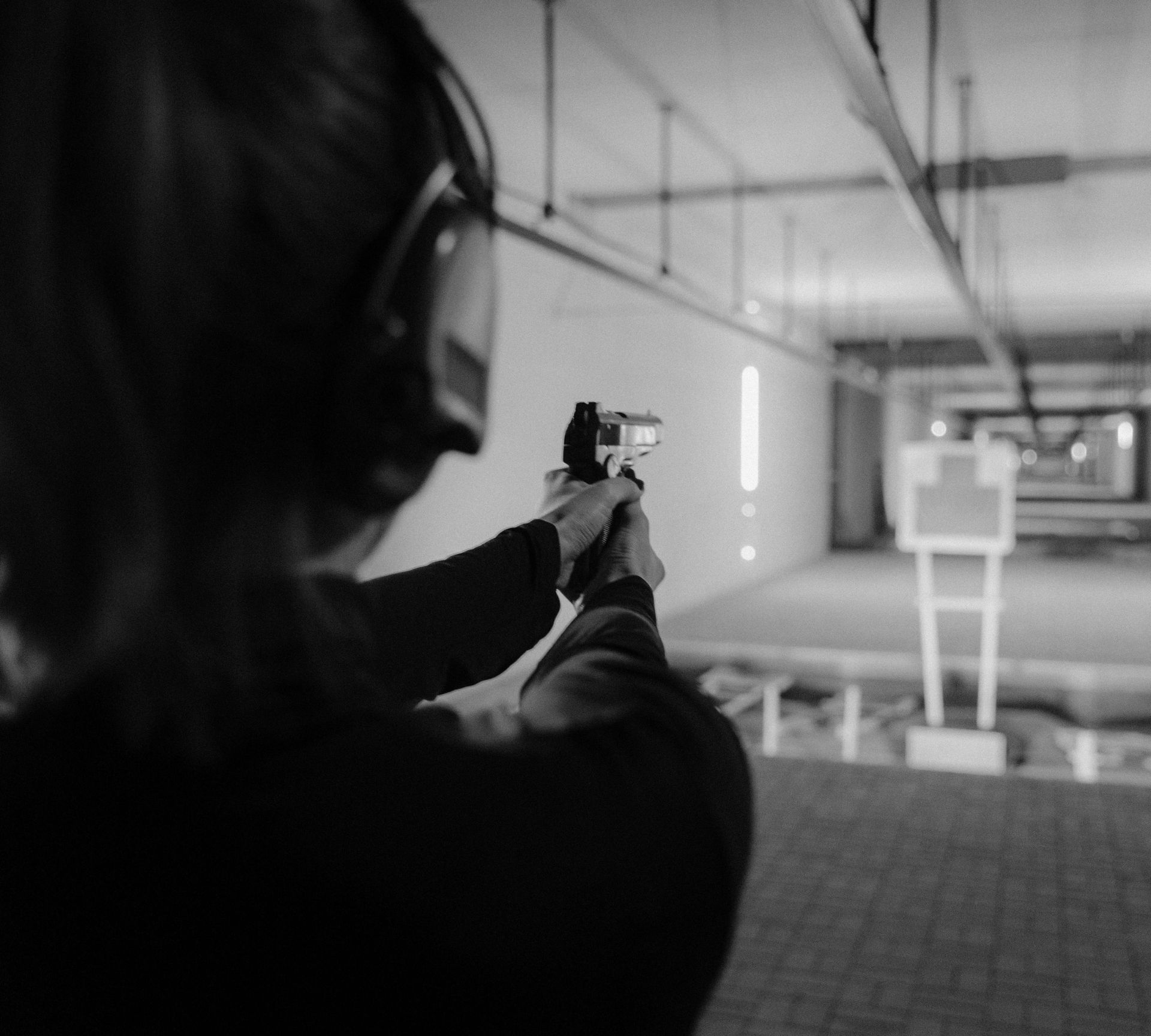 woman shooting at firing range